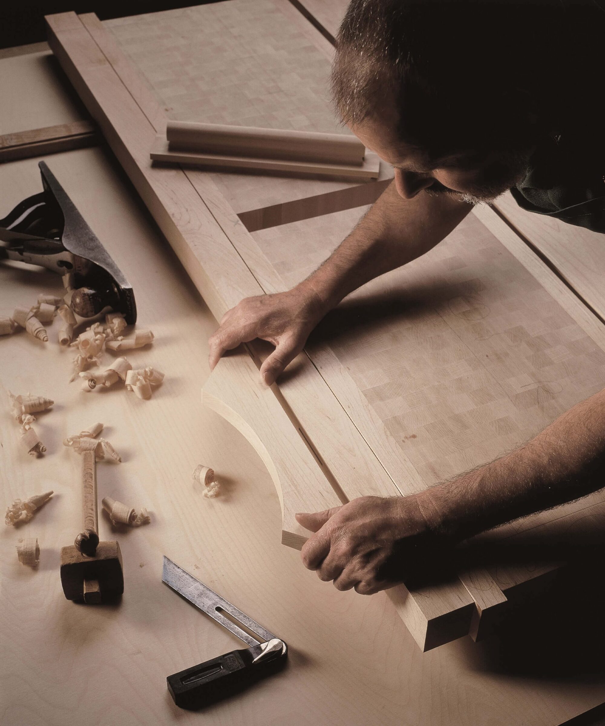 a handmade kitchen by Smallbone being crafted by a artisan craftsman