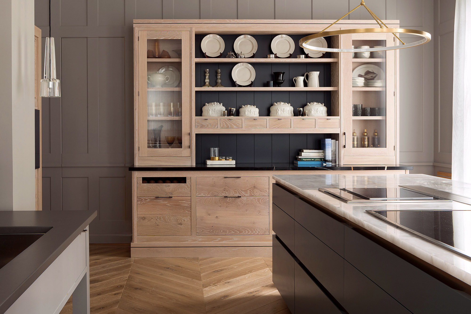 A Brasserie kitchen with grey coloured Modernist island