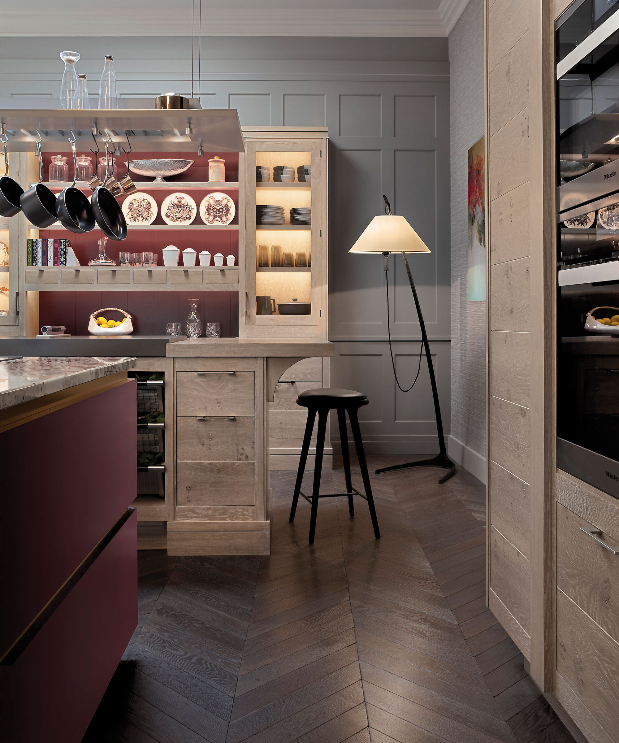 a smallbone brasserie kitchen with modernist central island in plum colour
